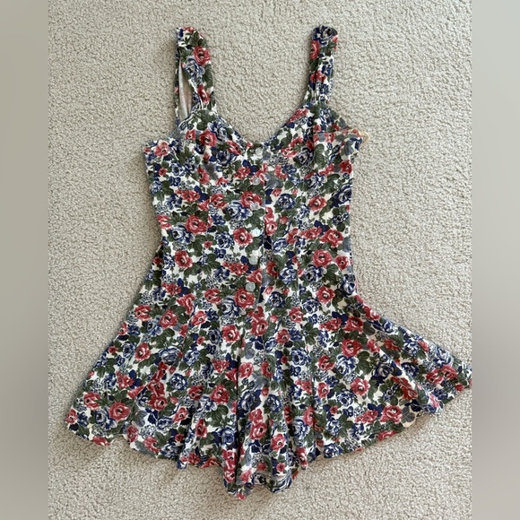 Energie Floral Print Romper with Red and Blue Accents - Picture 1 of 8